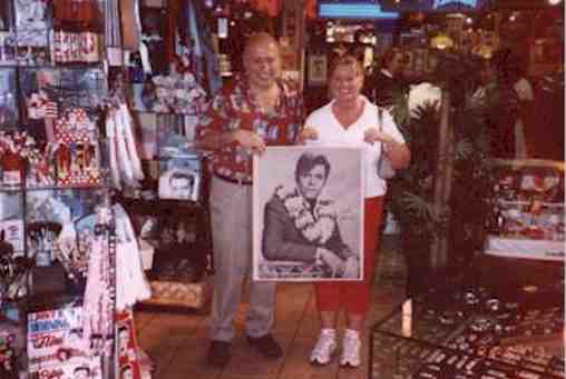 Gene 
Gelfo, the President of King's Village and Linda Smith with the Jack Lord poster